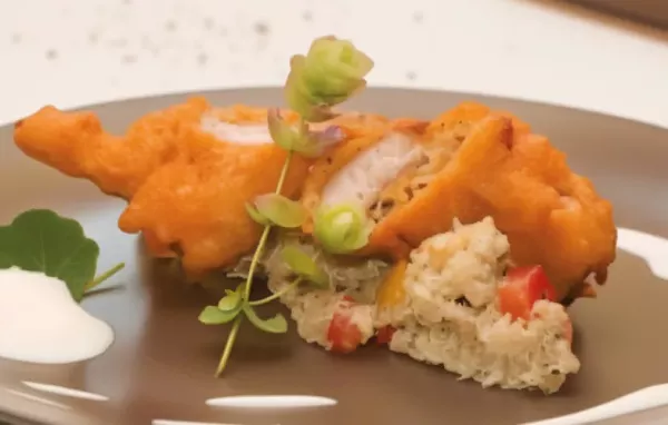 Köstliches Rezept für Karpfen im knusprigen Polenta-Bierteig auf einem frischen Quinoa-Salat