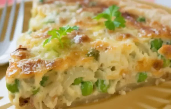 Saftige Quiche mit frischen Erbsen und cremigem Feta-Käse