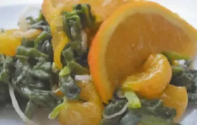 Mandarinen mit gebratenem Spinat