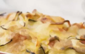 Saftiger Zucchini Auflauf mit Schinken und Käse